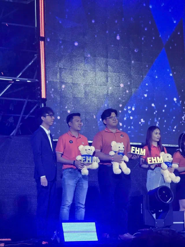 Receiving the FHM Best Performance award on stage